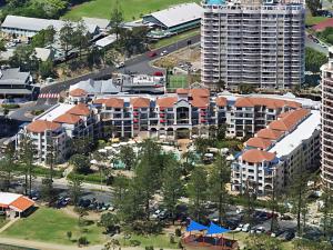 an aerial view of an apartment complex with buildings at Calypso Plaza Resort Unit 215 Beachfront Studio Apartment in Gold Coast