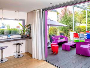 Khu vực ghế ngồi tại ibis Styles Rennes St. Gregoire