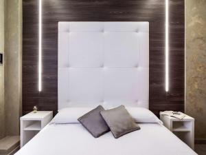 Кровать или кровати в номере Ibis Styles Milano Centro