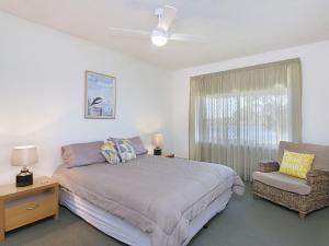 
A bed or beds in a room at River Haven Unit 1 - Absolute Tweed River frontage
