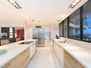 A kitchen or kitchenette at Seascape Apartments Unit 1201A - Luxury apartment with views of the Gold Coast and Hinterland