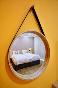 A bed or beds in a room at Dafu Qiandai Manor