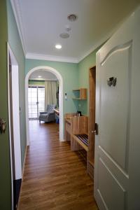 A bed or beds in a room at Dafu Qiandai Manor