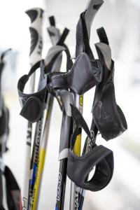 a bunch of pairs of scissors hanging from poles at Das Loft Hotel Willingen in Willingen