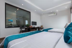 מיטה או מיטות בחדר ב-Airport Classic Hotel & Travel