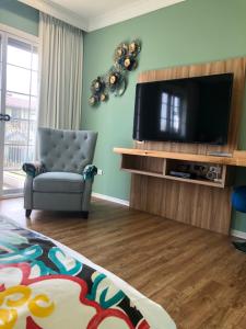 A television and/or entertainment centre at Dafu Qiandai Manor