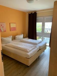 Postel nebo postele na pokoji v ubytování Suite Hotel Villa Erika