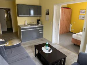 Kuchyň nebo kuchyňský kout v ubytování Suite Hotel Villa Erika