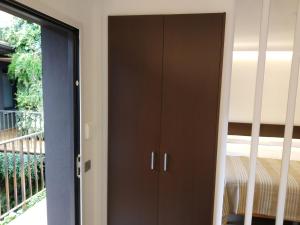 A bed or beds in a room at Hotel Olot Centre