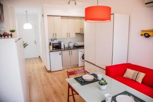 Kuchyň nebo kuchyňský kout v ubytování FIBES Apart Loft by Valcambre