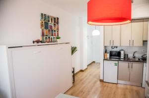Kuchyň nebo kuchyňský kout v ubytování FIBES Apart Loft by Valcambre