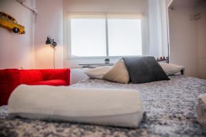 A bed or beds in a room at FIBES Apart Loft by Valcambre