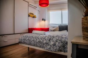 Postel nebo postele na pokoji v ubytování FIBES Apart Loft by Valcambre + 33 fotografií