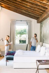 Hotel Bodega Tio Pepe客房内的一张或多张床位