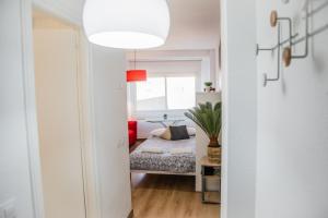 Postel nebo postele na pokoji v ubytování FIBES Apart Loft by Valcambre