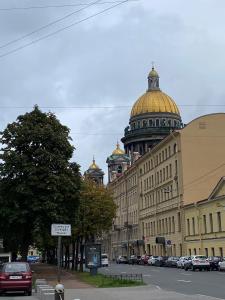a large building with a dome on the top of it at The Isaac Apart in Saint Petersburg