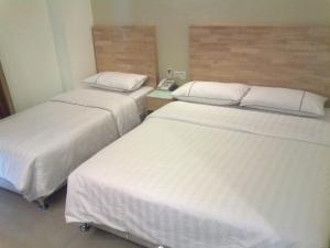 Postel nebo postele na pokoji v ubytování Hotel Desaria