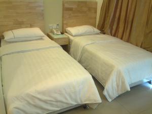 Postel nebo postele na pokoji v ubytování Hotel Desaria