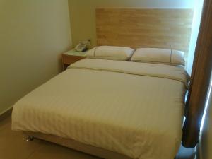 Postel nebo postele na pokoji v ubytování Hotel Desaria