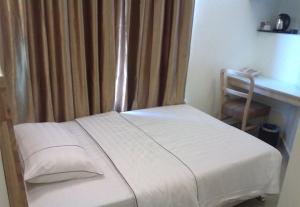 Postel nebo postele na pokoji v ubytování Hotel Desaria