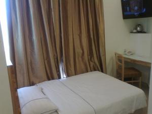 Postel nebo postele na pokoji v ubytování Hotel Desaria
