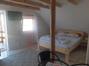 Postel nebo postele na pokoji v ubytování Mirella rooms