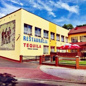 a building with a mural on the side of it at Hotel Tequila in Międzyrzecz