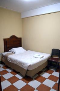 Postel nebo postele na pokoji v ubytování Hotel y Restaurante Castillo de los Altos