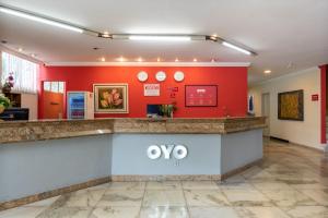Vestibiulis arba registratūra apgyvendinimo įstaigoje OYO Hotel L'Espace - Jaraguá Belo Horizonte