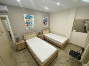 Postel nebo postele na pokoji v ubytování Dream Houses