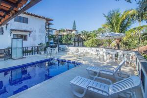 Bazén v ubytování Excelente Casa Duplex Búzios/Geribá, WI FI, churrasqueira privativa nebo v jeho okolí