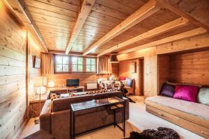 Cosy and comfortable studio ski-in and walking distance from the slopesにあるシーティングエリア