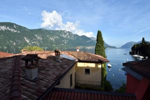 a view of a lake from the roofs of buildings at Bellagio Pescallo Guesthouse in Bellagio