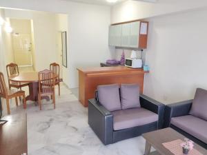 Kuchyň nebo kuchyňský kout v ubytování Wan's Apartment Bayu Beach Resort