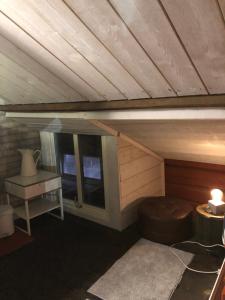 Postel nebo postele na pokoji v ubytování Stugan med Bryggan i Gamla Staden