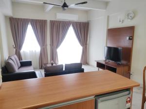 Gallery image of Wan's Apartment Bayu Beach Resort in Kampong Si Rusa