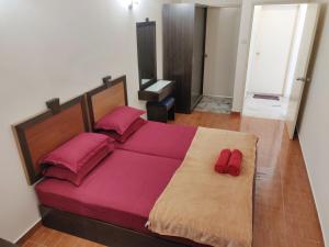 Katil atau katil-katil dalam bilik di Wan's Apartment Bayu Beach Resort
