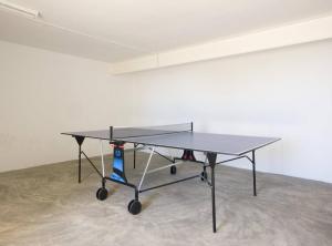 a ping pong table in a room at Villa Stefan - Plusholidays in Calpe