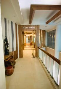 a view of a hallway in a building at Hotel The Galaxy in Jabalpur