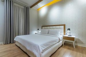 Postel nebo postele na pokoji v ubytování Villa Ester
