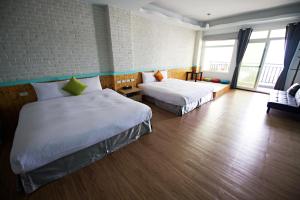 Letto o letti in una camera di 荷風民宿