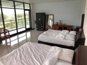 Una cama o camas en una habitación de Bao Chi B&B