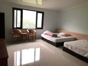 Una cama o camas en una habitación de Bao Chi B&B