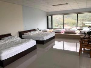 Una cama o camas en una habitación de Bao Chi B&B