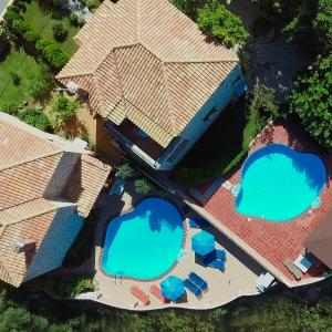an overhead view of a house with two swimming pools at Neriides Villas in Hersonissos