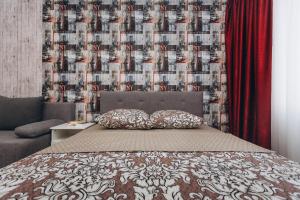 En eller flere senge i et værelse på Apart-hotel I. Sirko New Building 8 floor