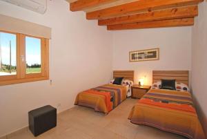Postel nebo postele na pokoji v ubytování 158 Finca Vinagrella ET3384 by Mallorca Charme + 16 fotografií