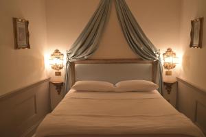 Llit o llits en una habitació de Al Ristoro di Handel
