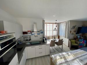 Η κουζίνα ή μικρή κουζίνα στο Ferienapartment 38 Sonnenwald