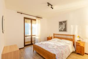 Postel nebo postele na pokoji v ubytování Casa Sofie e Charlotte